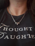 May include: A silver chain necklace with four silver cube-shaped charms hanging from it.